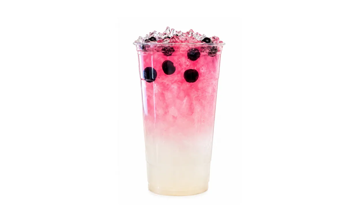Coconut Berry Digestive Aid refresher topped with fresh berries