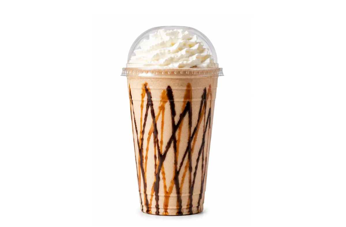 Reese's Cup protein shake with chocolate and peanut butter drizzle